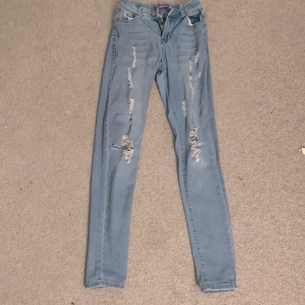 Ripped blue jeans